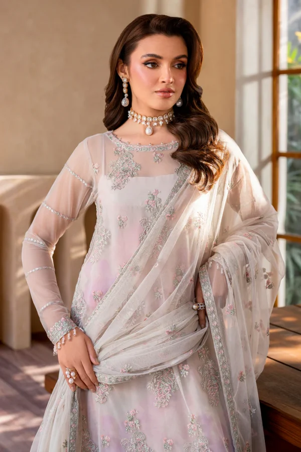 Zarif Pakistani designer dress with detailed embroidery, luxurious fabrics, modern silhouettes