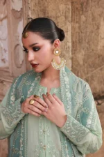 Nureh Maya Lawn Jacquard NJ-104 with embroidered jacquard shirt, lawn jacquard dupatta, and dyed cotton trouser, sleeves