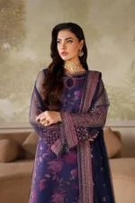 Model wearing pastel embroidered lehenga from Zarif New Collection 2025, featuring floral design and elegant dupatta.