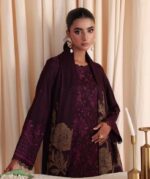 Model wearing maroon embroidered leather peach suit with jacquard shawl from Dastaan By Riaz Arts DS-01 winter collection.
