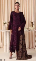 Model wearing maroon embroidered leather peach suit with jacquard shawl from Dastaan By Riaz Arts DS-01 winter collection.