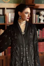 luxurious Maria B Winter Luxe 2025 WL-1307, an elegant black embroidered linen suit with velvet appliques and a plush palachi dupatta.