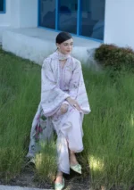 Elaf Unstitched Lawn Prints '26-EPN-4B DOLL ME UP pastel floral digital lawn suit with voile dupatta and cambric trouser, model in sitting position