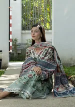 features soft botanical florals, vintage motifs, and detailed borders. 3-piece suit with cambric trouser and voile dupatta. front neck and sleeves