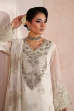 The graceful ALIZEH | AYMAL | Luxury Bamber Chiffon | Zeba-05 unstitched ensemble. Notice the detailed organza chalk borders along the front, back, sleeves, and the elegant trouser hem. neck closeup