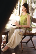 Maria B M.Prints Spring Summer Lawn ’26-9A green unstitched embroidered printed lawn shirt with embroidered neckline, dyed/printed cambric trouser, and printed chiffon dupatta, side look