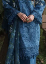 Sardinia - Tales of Petals - Luxury Lawn Suit - Blue Blossom - Unstitched 3PC Set. Showcasing Chikankari embroidery on lawn, organza neck motifs, and a printed net dupatta. closeup of shirt daman border