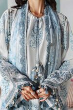 Shop Maria B M.Prints Unstitched Embroidered Lawn Suit-MPT 09a in the UK. Elegant white & blue 3-piece Eid lawn suit with embroidery, front kameez neck and sleeves close look