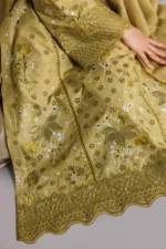Iznik Embroidered Lawn Suit IBE-09 mustard Pakistani lawn suit with Swiss lawn dupatta and embroidery, sleeves and kameez daman close up