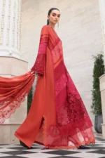 Maria B Embroidered Lawn Suit EL-26-13 in rich rust tones with elegant embroidered organza detailing. A luxury Pakistani Eid outfit featuring burnout silk dupatta and sophisticated festive embroidery, side look