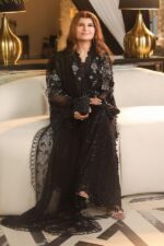 3-Piece Unstitiched Maria B Chiffon | Brunch Appetit | MPC-26-204, luxurious embroidered black color suit at Zee Collections UK, front look in sitting positin of model